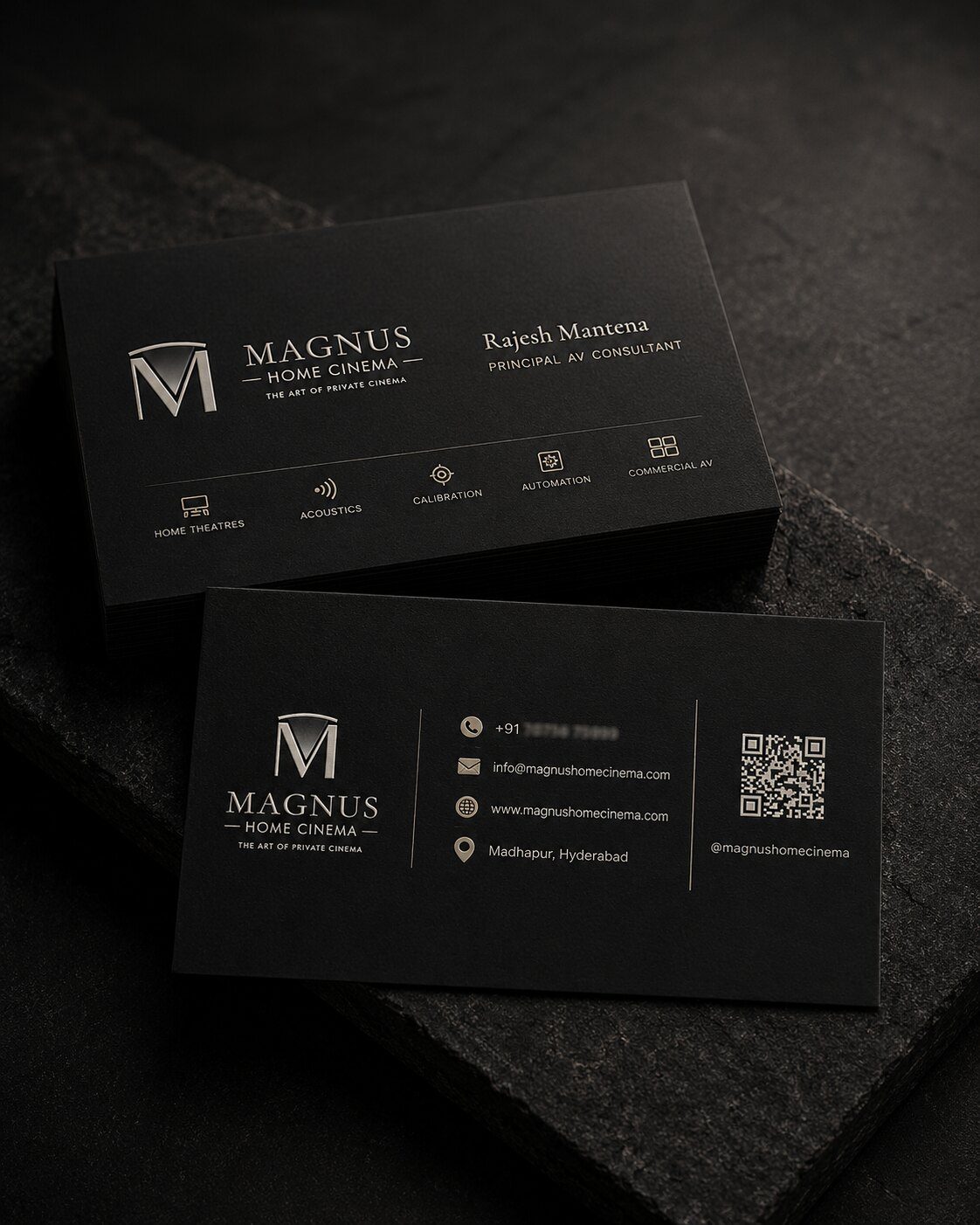 Magnus business cards on stone